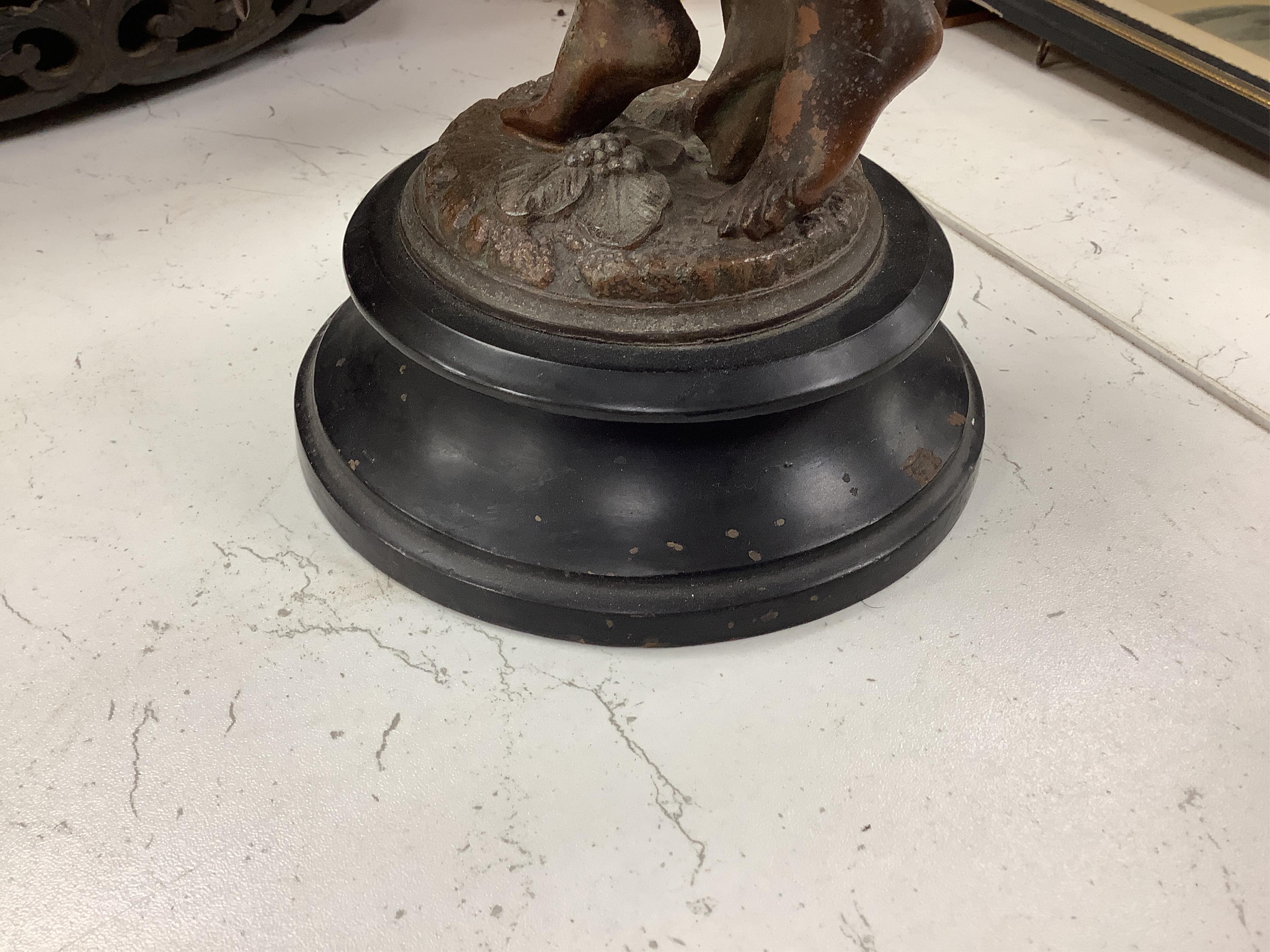 A late 19th century spelter figural mystery clock, 63cm high